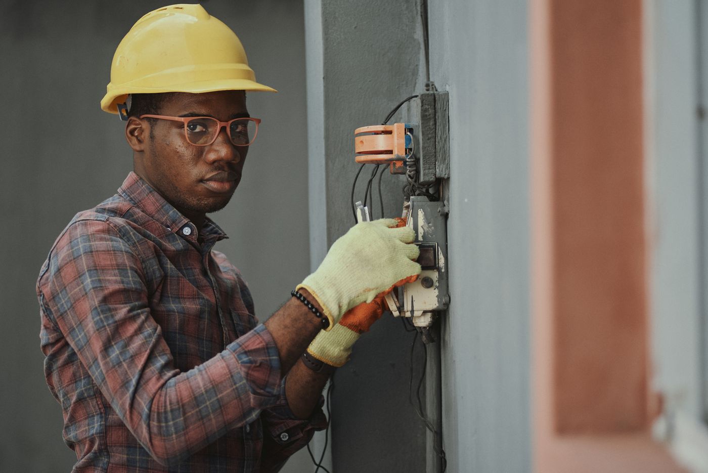 An electrician working on an electrical installation