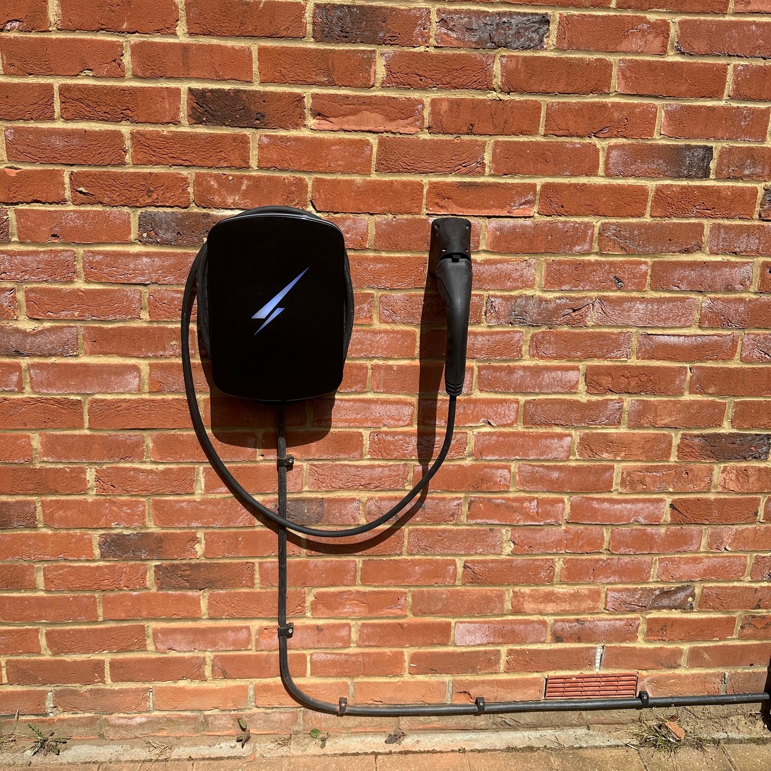 Home EV charge point, cables hidden from box to charger